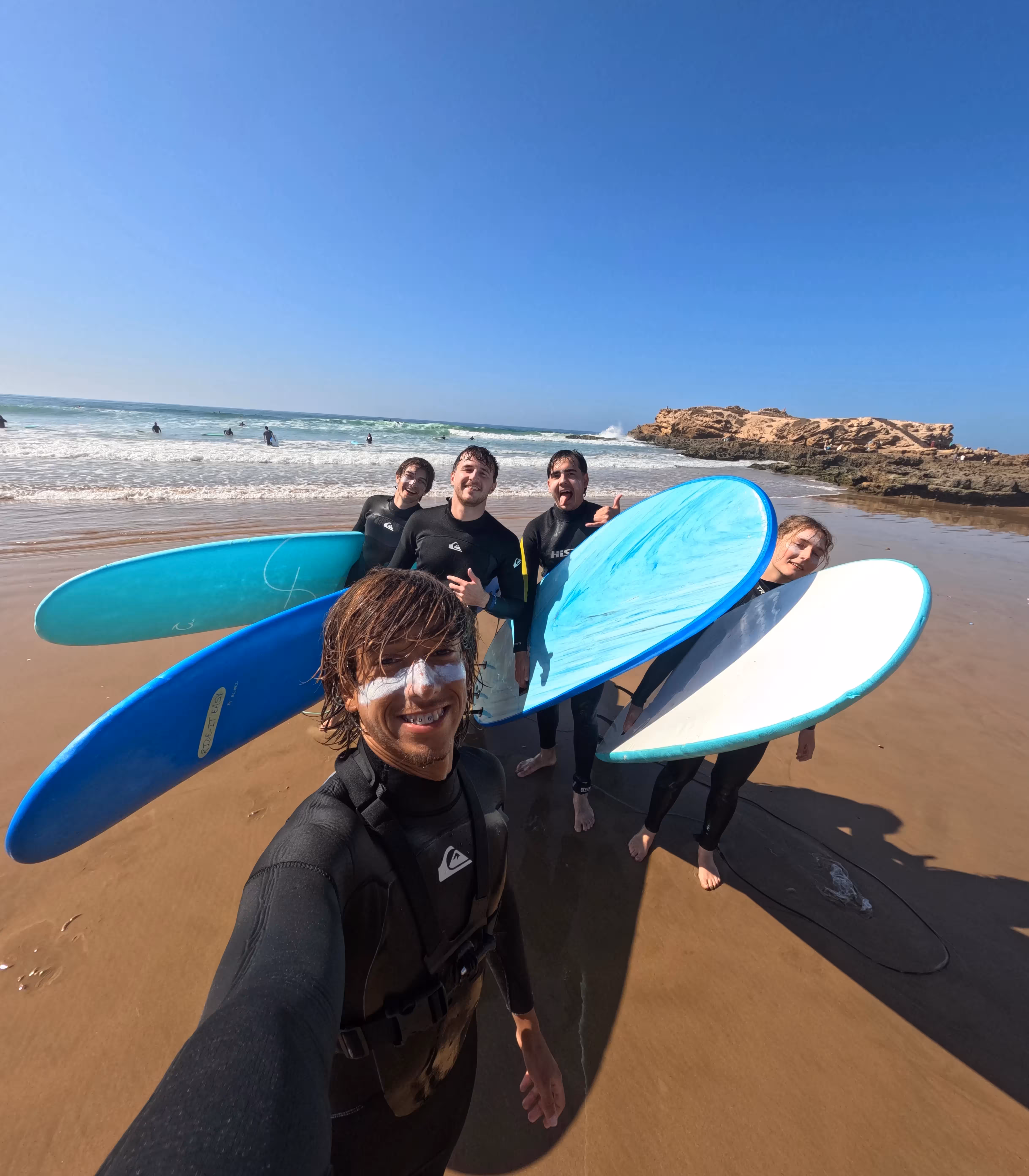 Coastal view with surfer