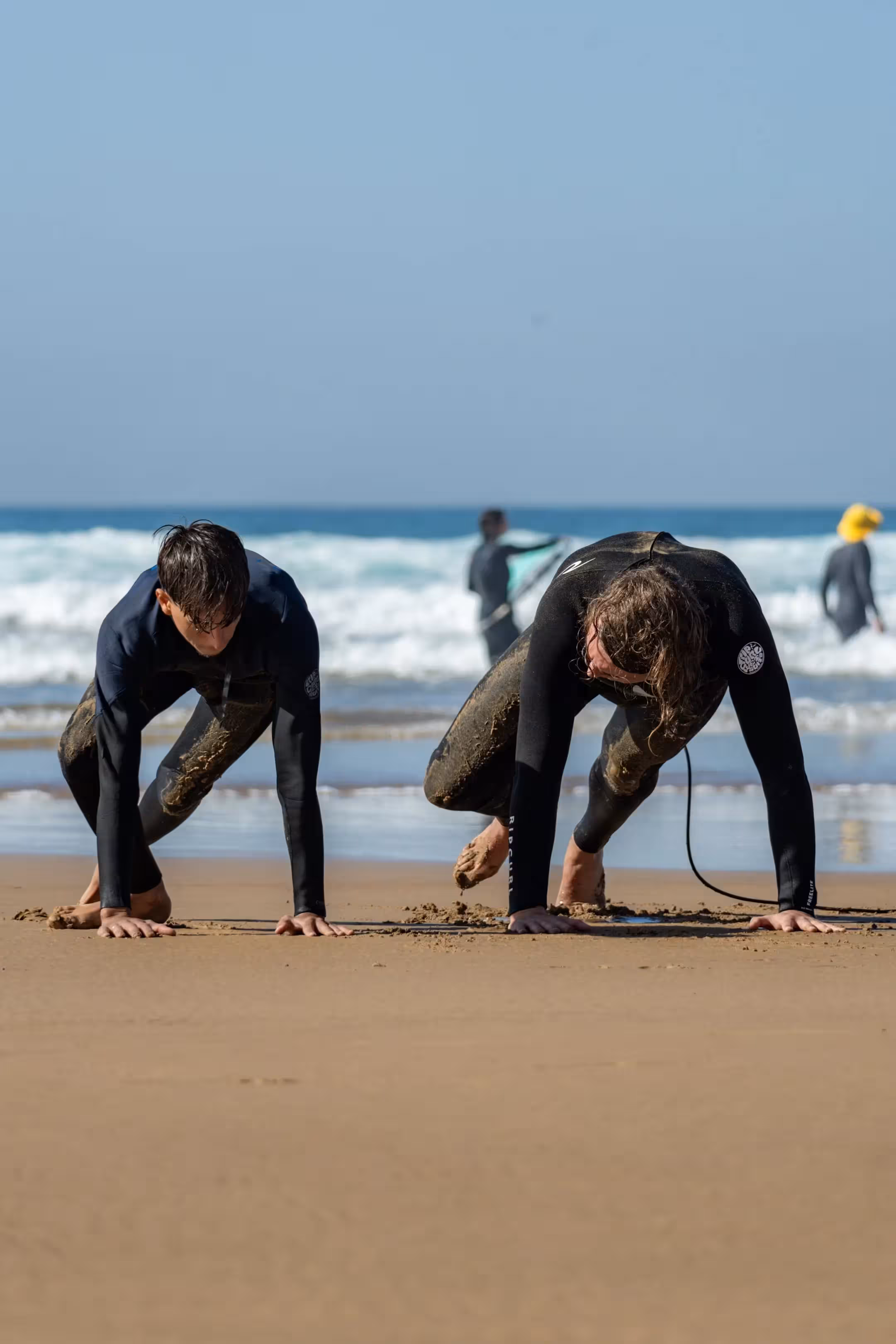 Group surf lesson on the beach